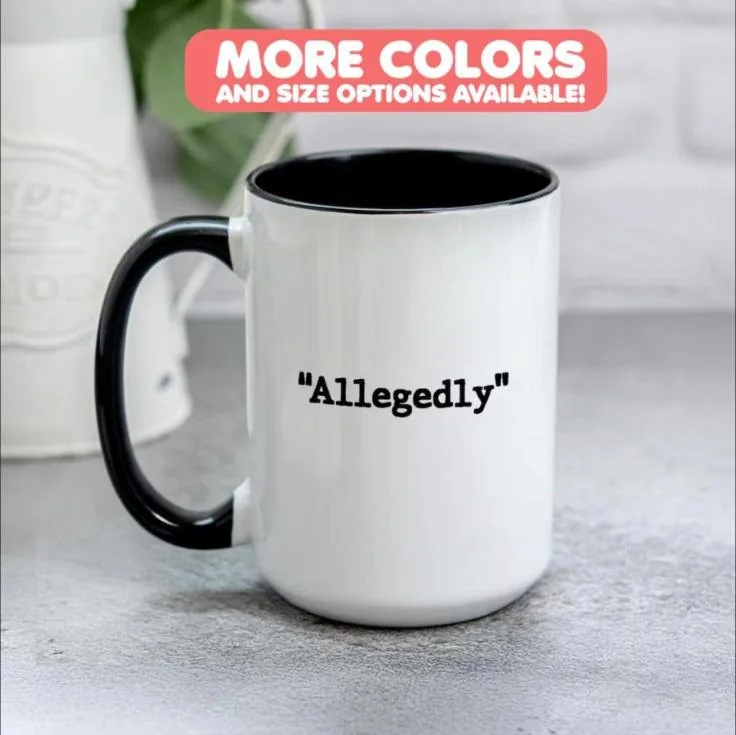 White mug with a black handle printed Allegedly