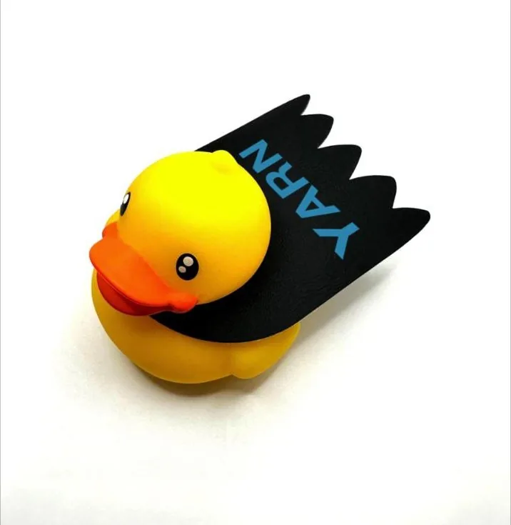 Yellow rubber duck wearing a black cape printed with YARN