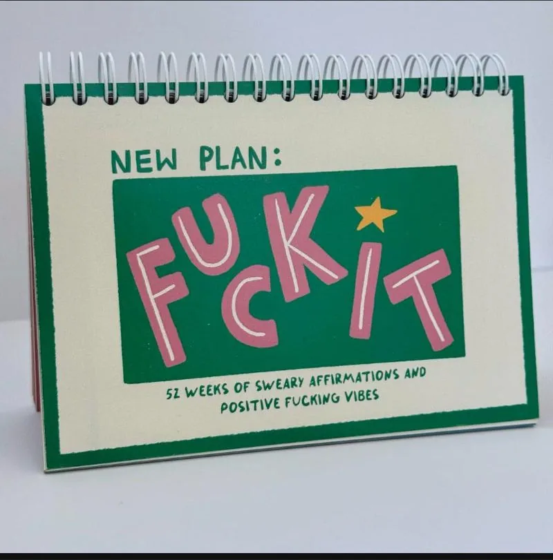 Desk flip chart of sweary weekly affirmations on a stand