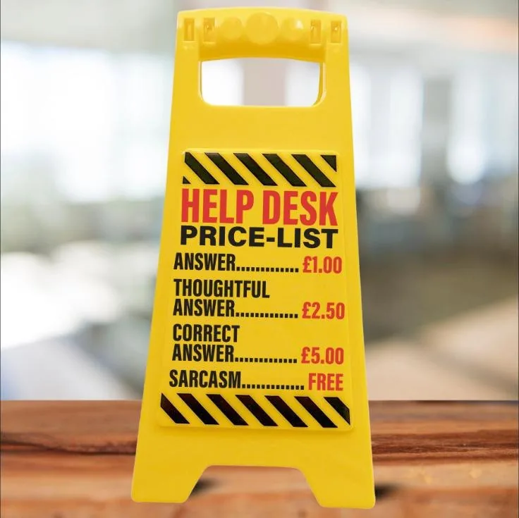 Yellow desk warning sign with a help desk price list