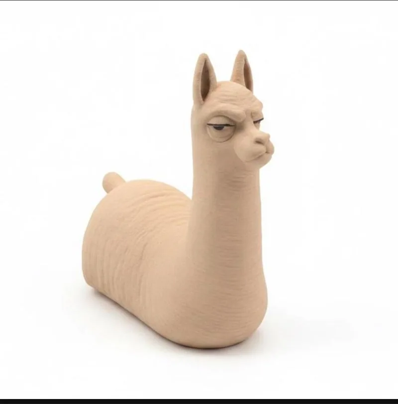 Small 3D-printed llama figure on a desk
