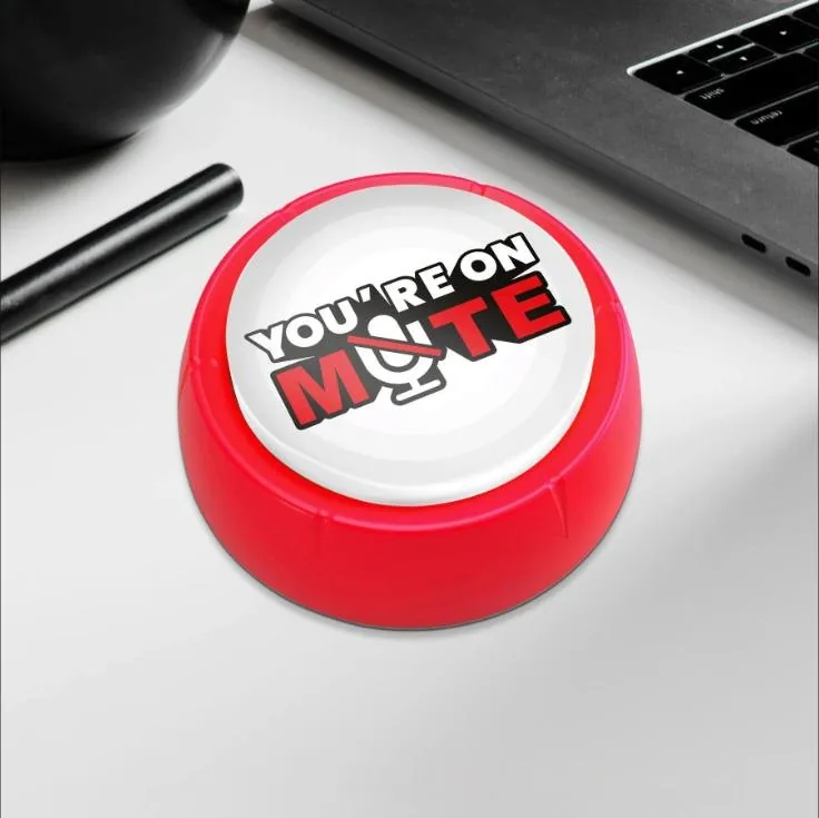 Red and white push button reading You're on mute