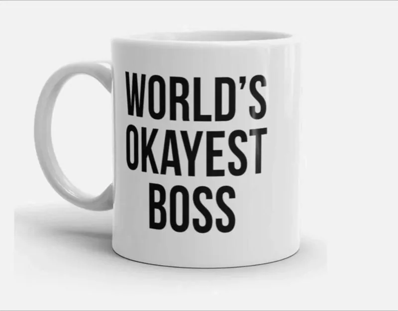 White mug printed with World's Okayest Boss