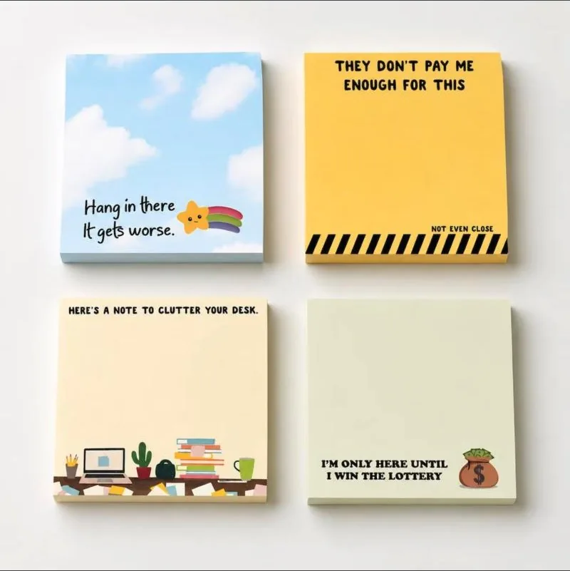 Four pads of sticky notes with sarcastic office messages